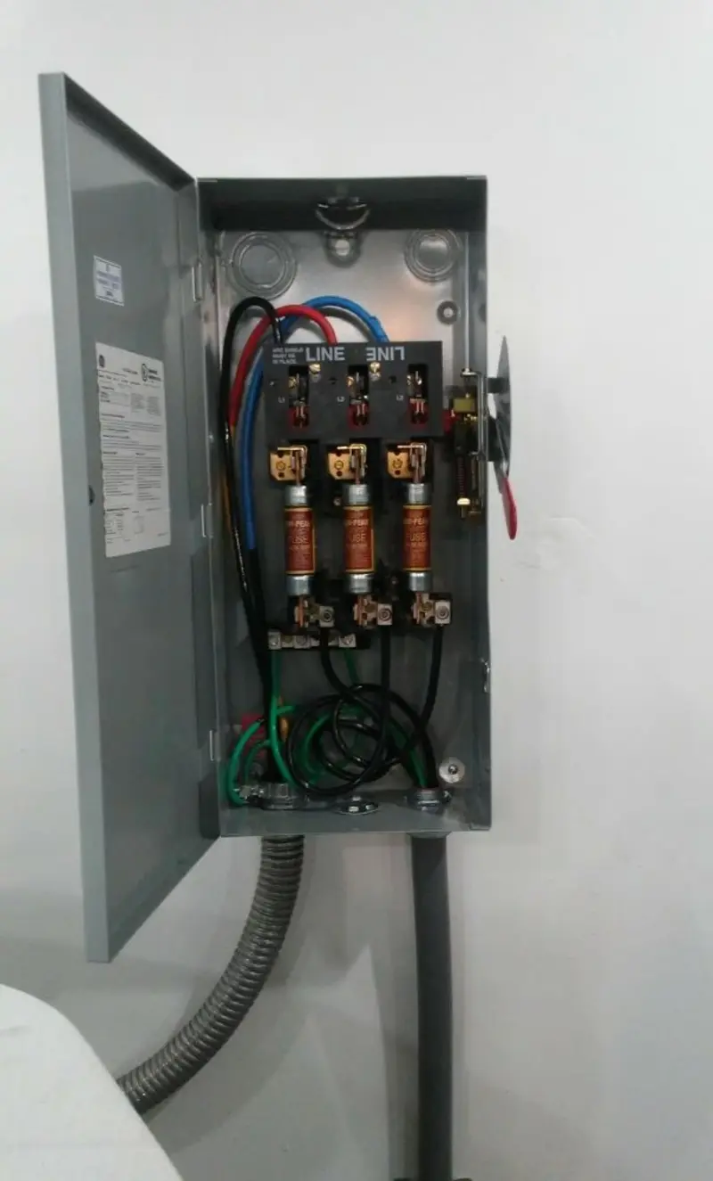 Three-phase disconnect switch installed for Smoke Detector Installation in Gregg