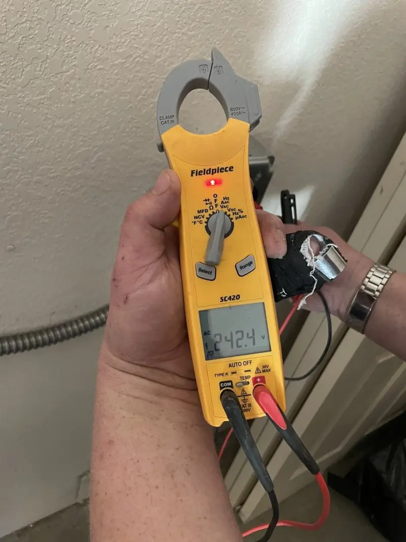 Voltage testing with clamp meter during Hot Tub / Pool Electrical Wiring in Gregg